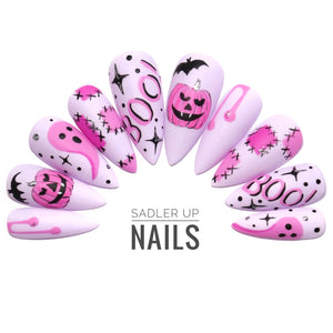 Pink Halloween press on nails.