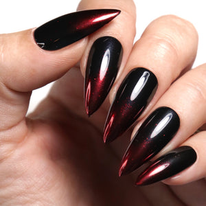 Red chrome nails.
